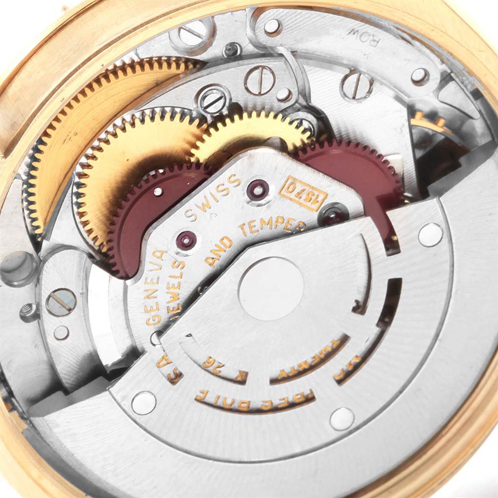 This image shows a close-up, internal view of the Rolex Vintage Collection 1003 Men's Yellow Gold Silver Dial 1003 Men's Yellow Gold Silver Dial watch movement, highlighting gears and mechanical components.