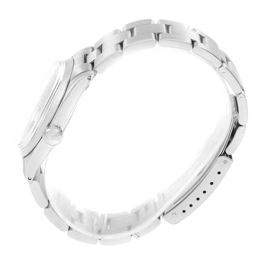 This image shows a side view of a Rolex Vintage Collection 6426 Men's Stainless Steel Black Dial 6426 Men's Stainless Steel Black Dial watch, focusing on the case, crown, and bracelet.