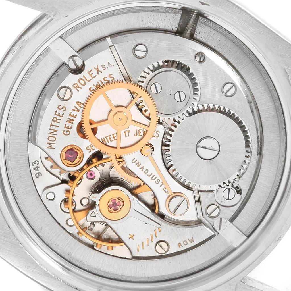 This image shows the internal mechanical movement of a Vintage Collection model by Rolex, highlighting gears and intricate components.