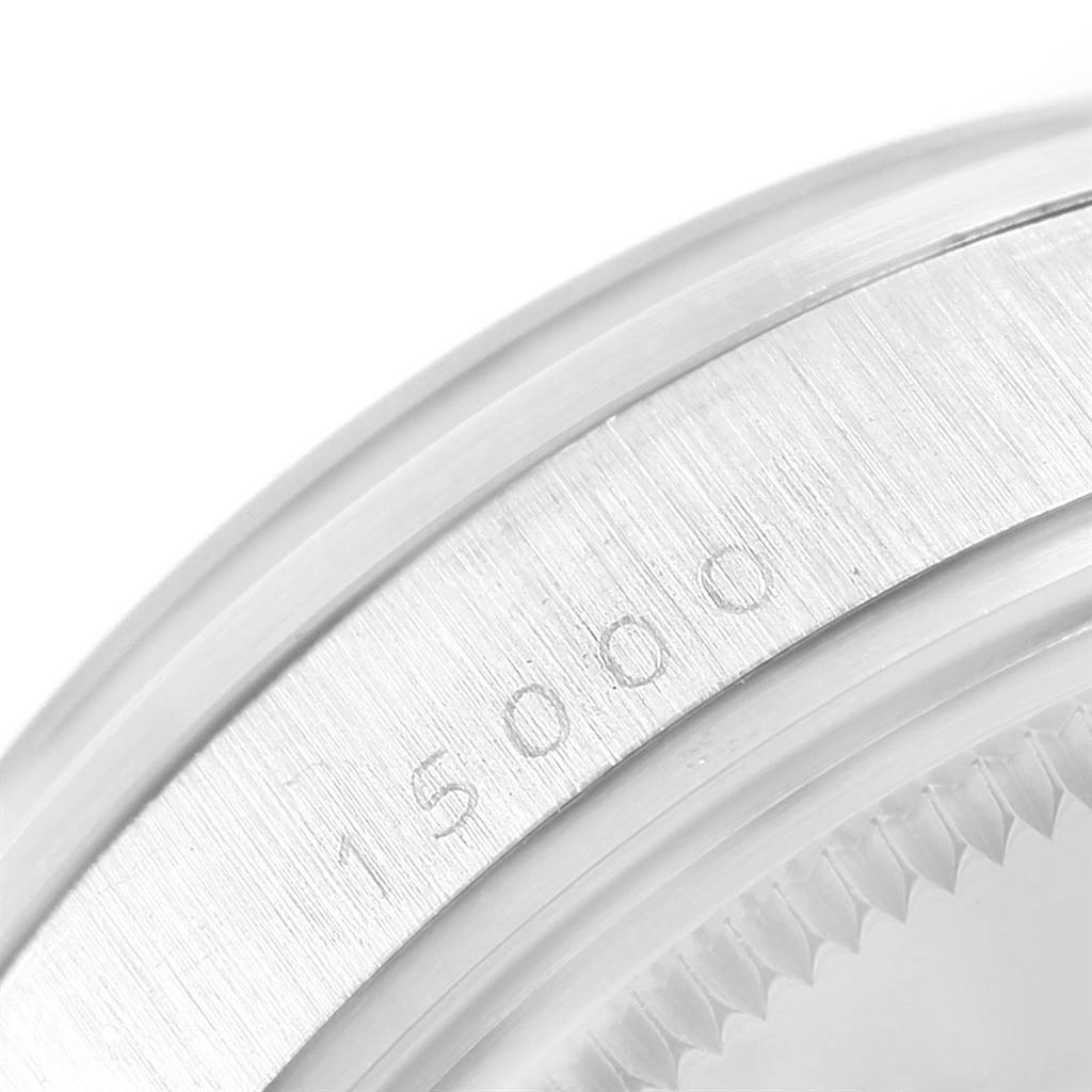 This close-up image of the Rolex Vintage Collection 15000 Men's Stainless Steel Black Dial 15000 Men's Stainless Steel Black Dial watch shows a partial view of the bezel and engraving with the model number "15000".