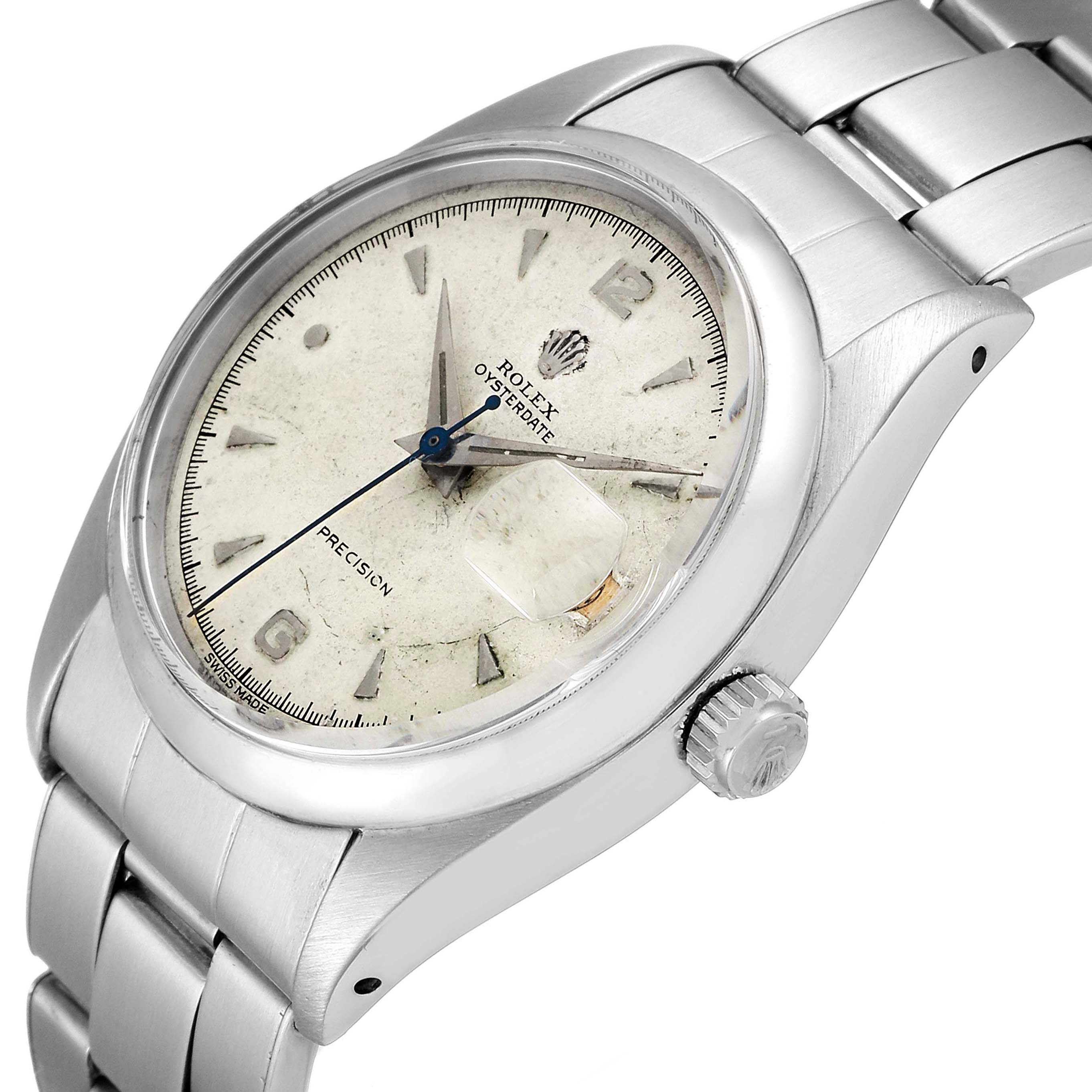 The image shows a close-up of a Rolex Vintage Collection 6494 Men's Stainless Steel Silver Dial 6494 Men's Stainless Steel Silver Dial watch, highlighting the face, bezel, crown, and part of the bracelet.
