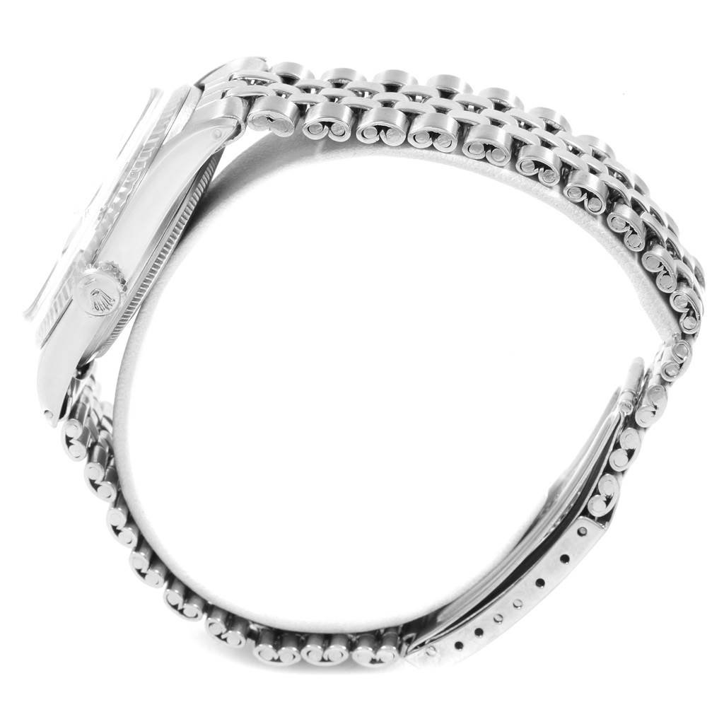 The image shows a side view of the Rolex Vintage Collection 1601 Men's Stainless Steel Silver Dial 1601 Men's Stainless Steel Silver Dial model, highlighting the watch face side, crown, and metal bracelet.