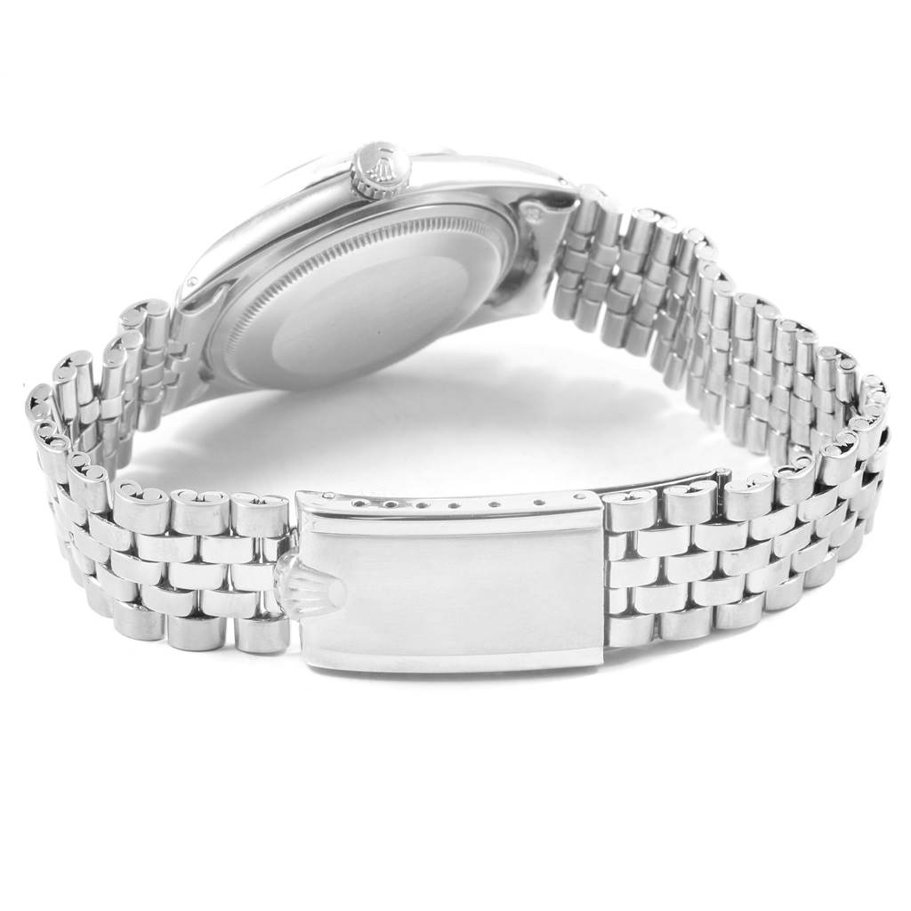 This image shows the back view of a Rolex Vintage Collection 1601 Men's Stainless Steel Silver Dial 1601 Men's Stainless Steel Silver Dial watch, highlighting the case back, crown, and bracelet clasp.