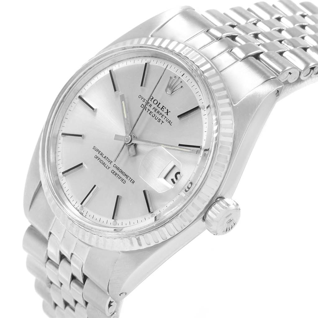 This image shows a close-up angled view of the face and part of the strap of the Rolex Vintage Collection 1601 Men's Stainless Steel Silver Dial 1601 Men's Stainless Steel Silver Dial watch.