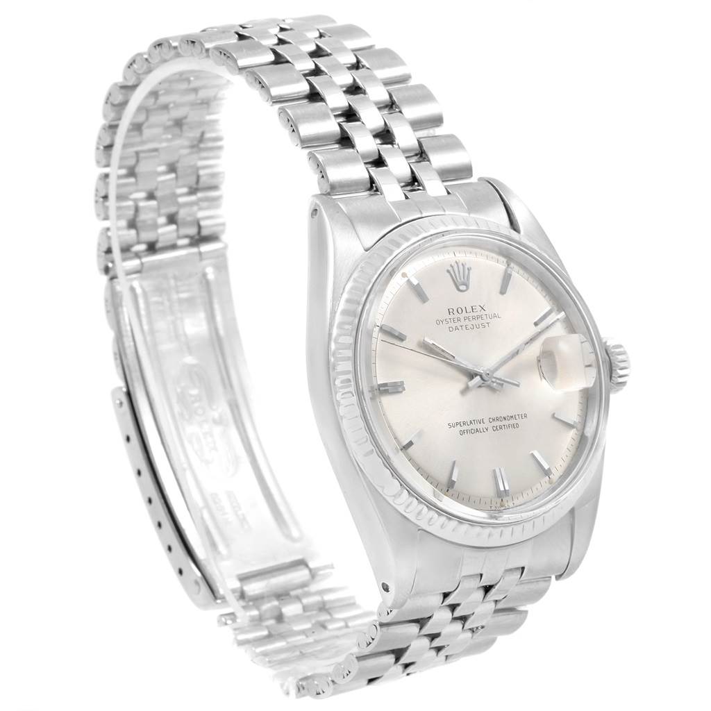 The image shows a side-angle view of a Rolex Vintage Collection 1601 Men's Stainless Steel Silver Dial 1601 Men's Stainless Steel Silver Dial watch, highlighting its face, bezel, crown, and bracelet.