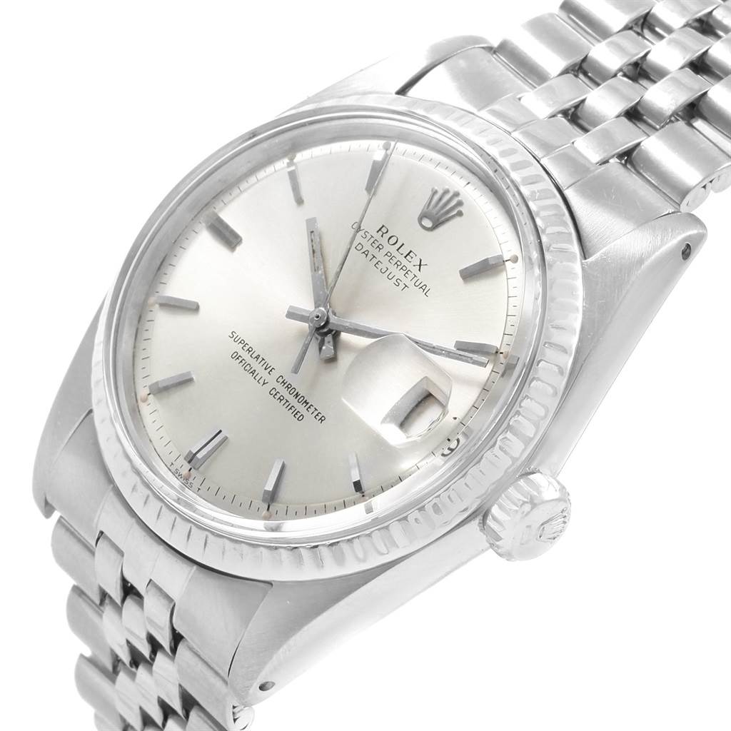 The image shows a side and partial front view of the Rolex Vintage Collection 1601 Men's Stainless Steel Silver Dial 1601 Men's Stainless Steel Silver Dial watch, highlighting its dial, crown, and bracelet.