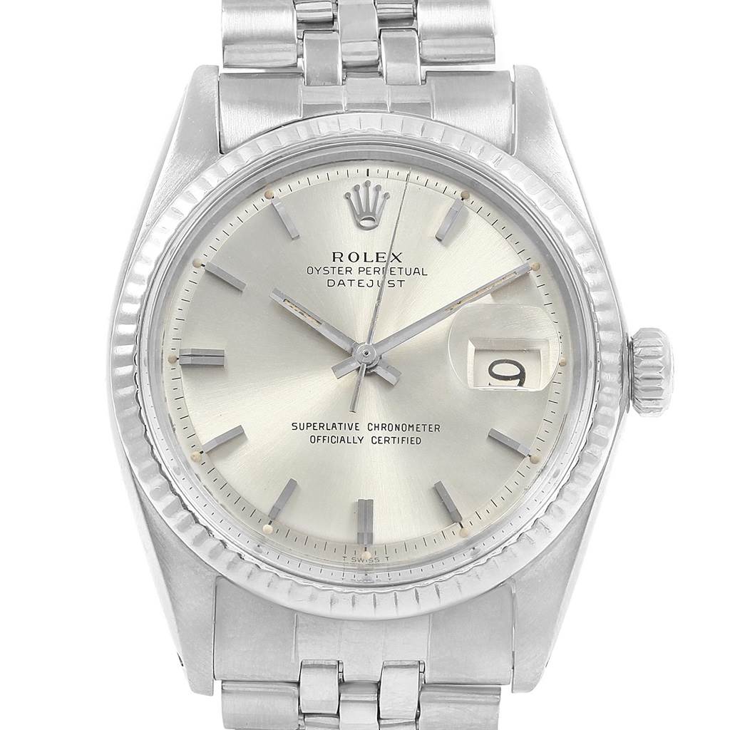 This image shows a close-up of the face and bracelet of the Rolex Vintage Collection 1601 Men's Stainless Steel Silver Dial 1601 Men's Stainless Steel Silver Dial Oyster Perpetual Datejust watch.