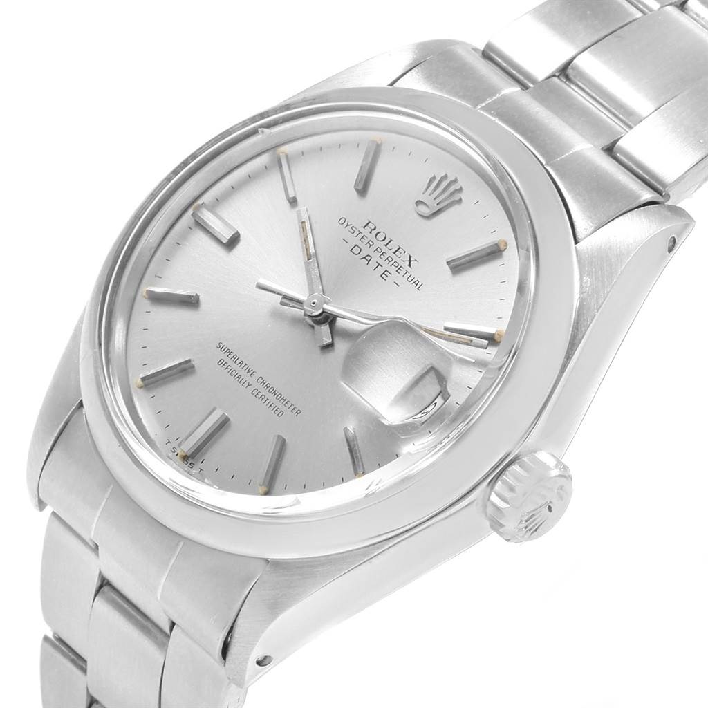 The Rolex Vintage Collection 15000 Men
s Stainless Steel Silver Dial 15000 Men
s Stainless Steel Silver Dial watch is shown at a slightly tilted top view, displaying the dial, crown, and part of the bracelet.