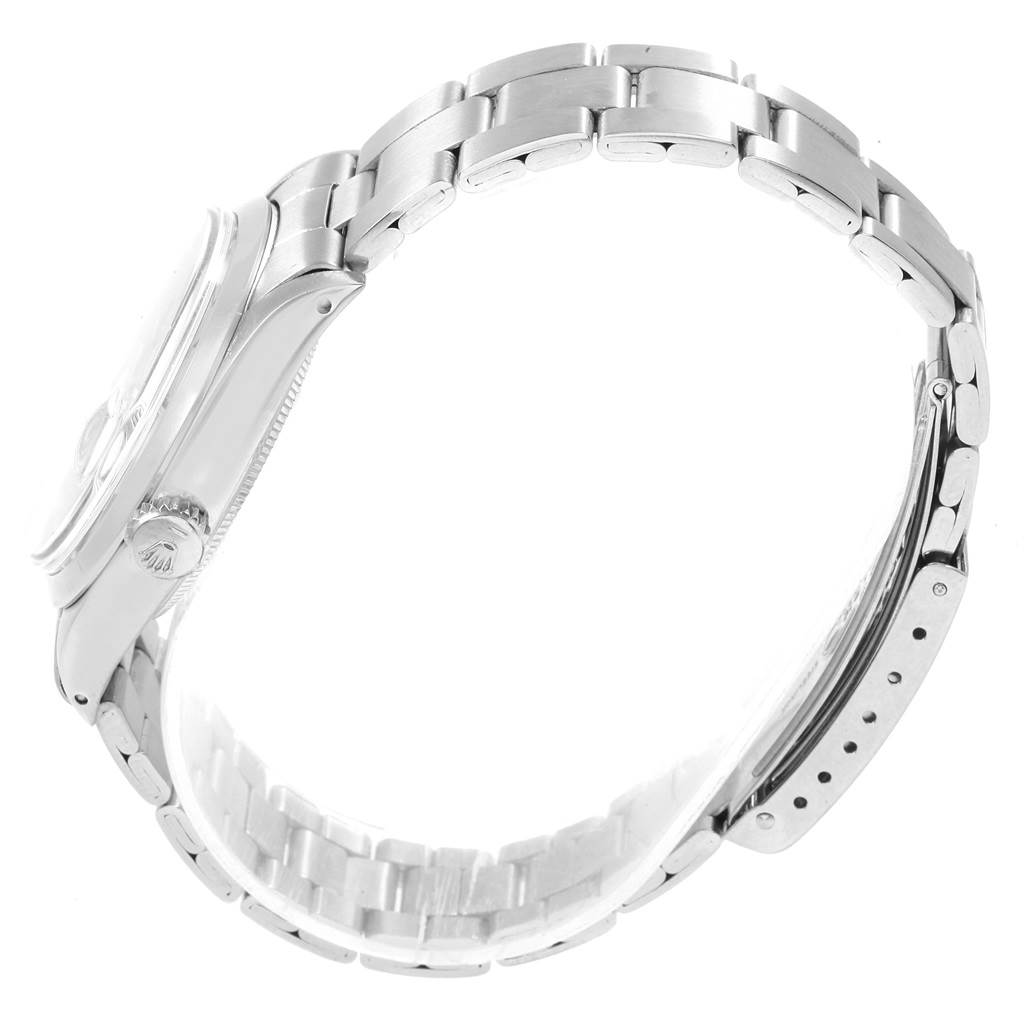 The image shows a side view of a Rolex Vintage Collection 15000 Men
s Stainless Steel Silver Dial 15000 Men
s Stainless Steel Silver Dial watch, highlighting the bracelet, clasp, and part of the case.