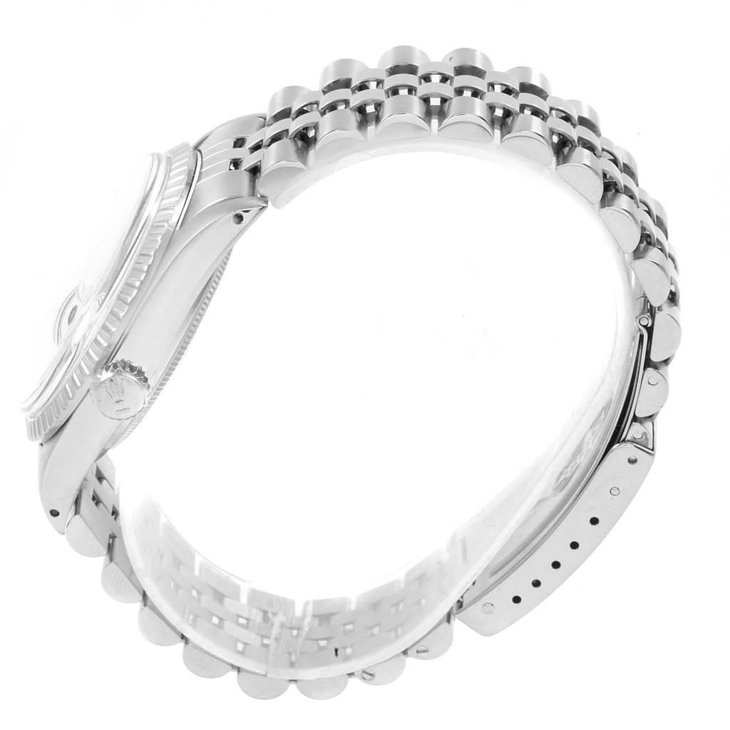 The image shows a side angle of a Rolex Vintage Collection 16030 Men's Stainless Steel White Dial 16030 Men's Stainless Steel White Dial watch, highlighting its bezel, crown, and metal bracelet.