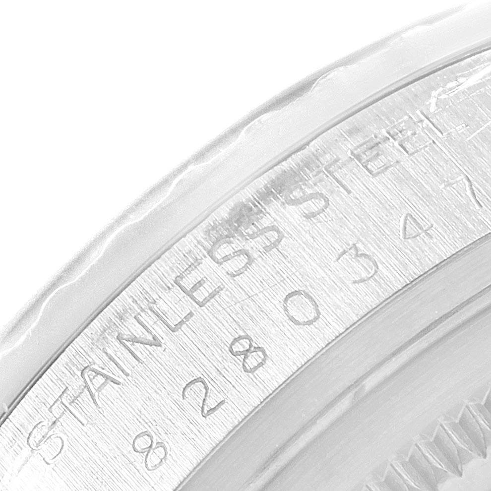 This image shows a close-up of the stainless steel bezel of a Rolex Vintage Collection 16030 Men's Stainless Steel White Dial 16030 Men's Stainless Steel White Dial watch.