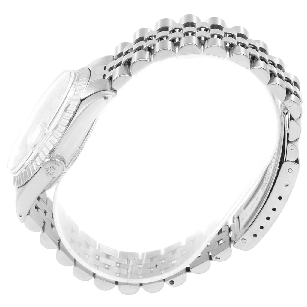 The image shows a Rolex Vintage Collection 1603 Men's Stainless Steel Silver Dial 1603 Men's Stainless Steel Silver Dial watch from a side angle, highlighting the bezel, crown, and bracelet.