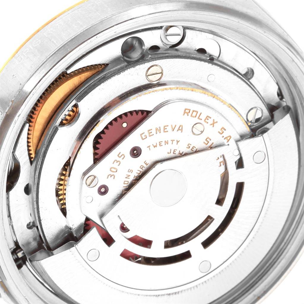 This image shows the internal mechanical movement of a Rolex Vintage Collection 16013 Men's Stainless Steel White Dial 16013 Men's Stainless Steel White Dial watch, including gears and the rotor.