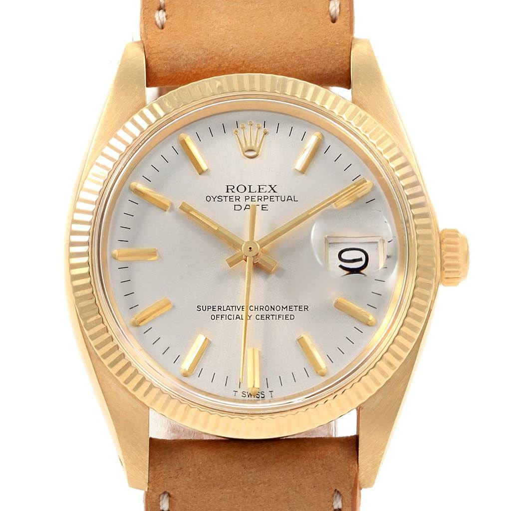 This image shows a front view of the Rolex Vintage Collection 1501 Men's Yellow Gold Champagne Dial 1501 Men's Yellow Gold Champagne Dial model with a gold bezel, white dial, and a leather strap.