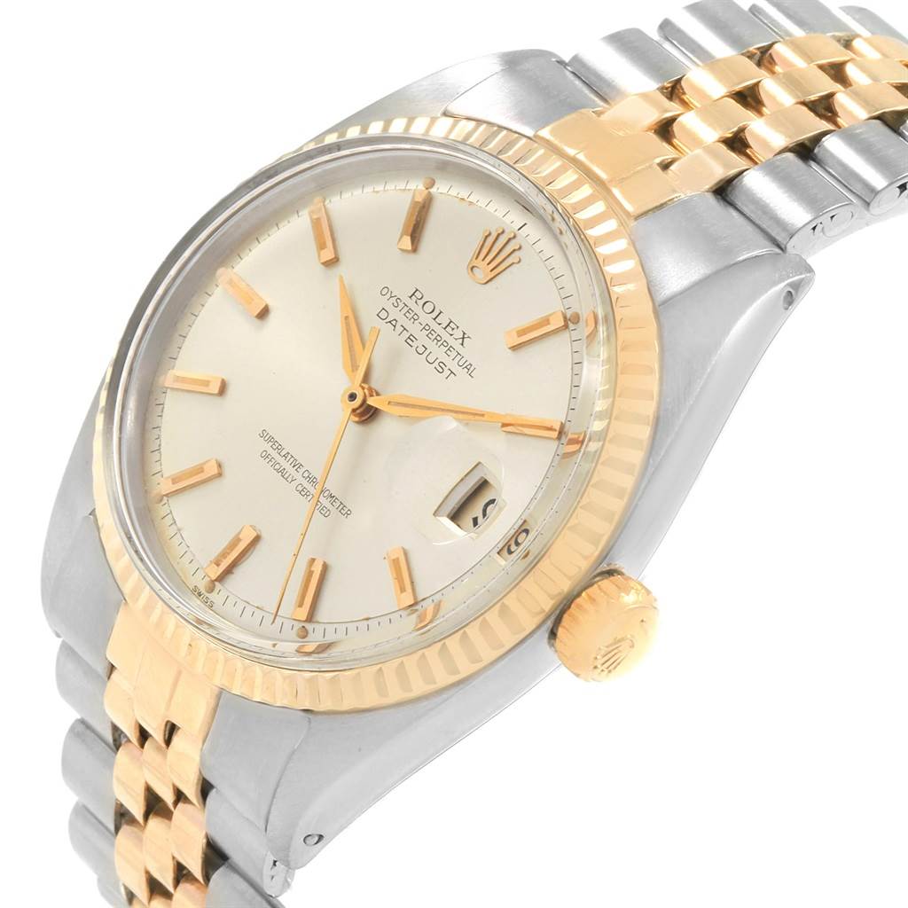 The Rolex Vintage Collection 1601 Men's Steel and Gold (two tone) Silver Dial 1601 Men's Steel and Gold (two tone) Silver Dial watch is shown at an angle, featuring its face, bezel, crown, and part of the bracelet.