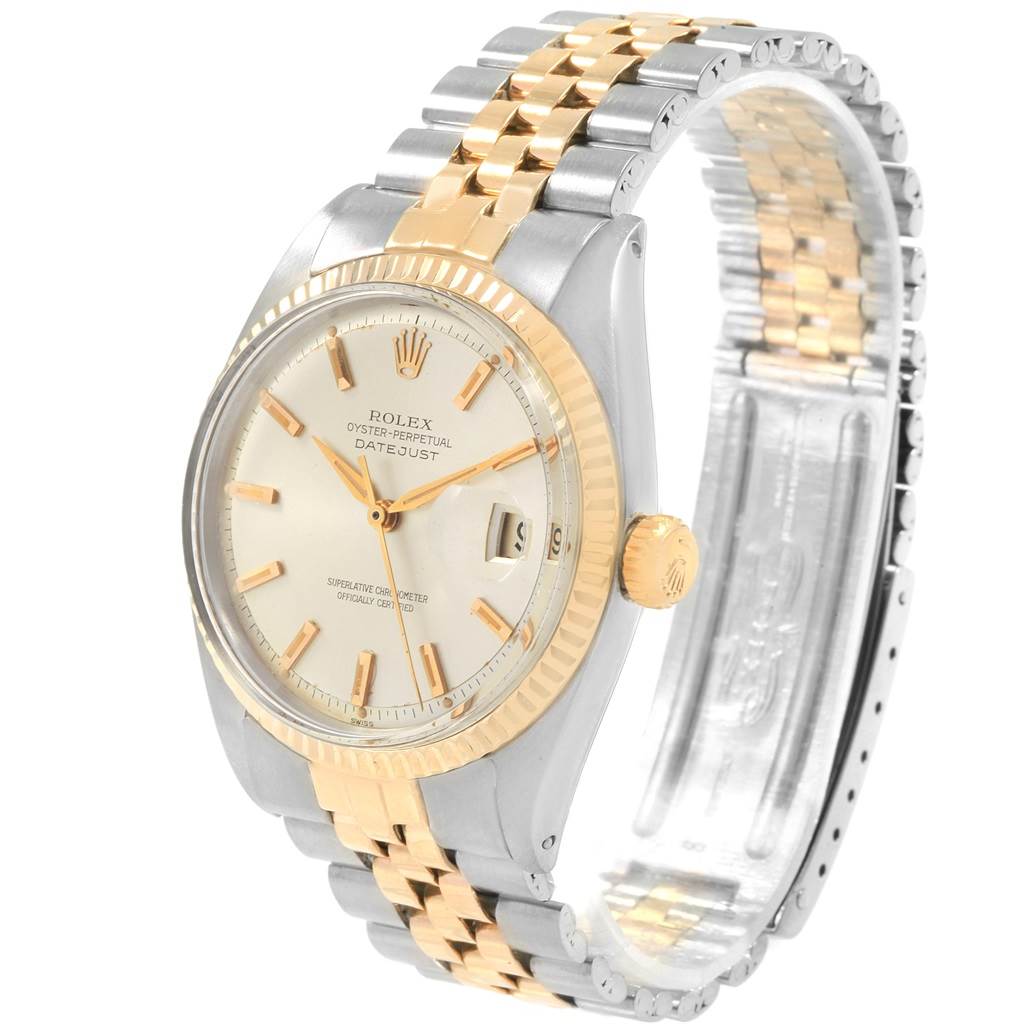 The Rolex Vintage Collection 1601 Men's Steel and Gold (two tone) Silver Dial 1601 Men's Steel and Gold (two tone) Silver Dial model is shown at an angled side view, displaying its band, face, and crown.