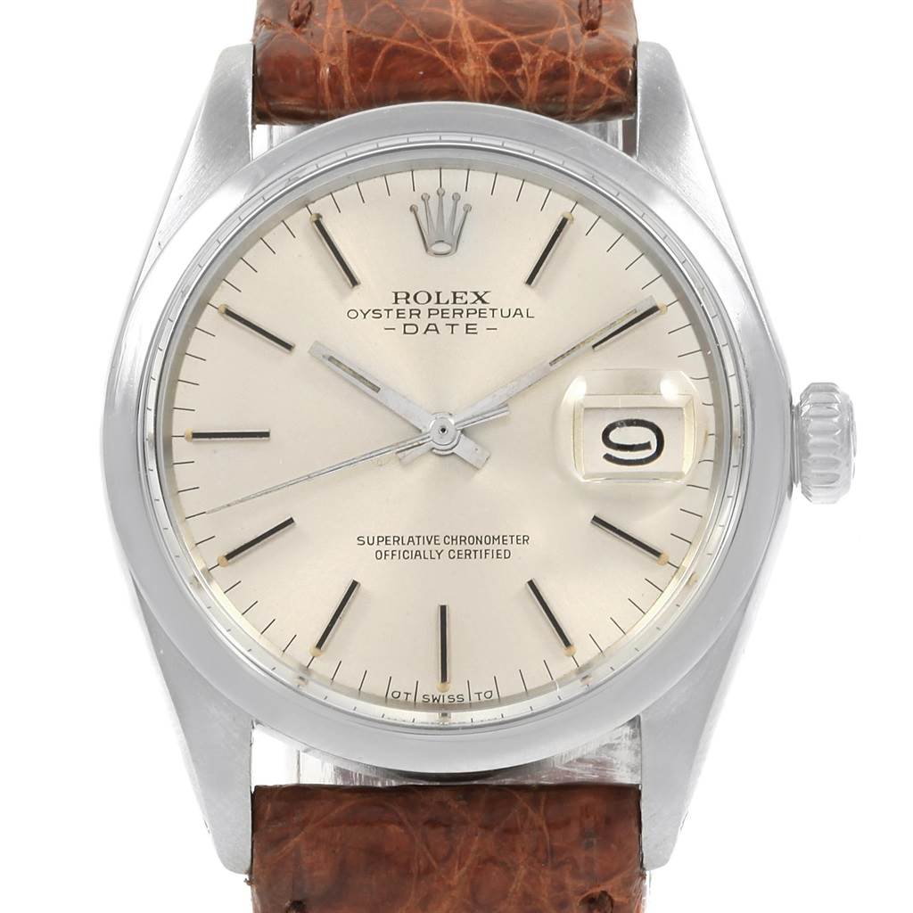 This image shows a frontal view of the Rolex Vintage Collection 1500 Men's Stainless Steel Silver Dial 1500 Men's Stainless Steel Silver Dial Oyster Perpetual Date watch, detailing the dial, hands, crown, and leather strap.