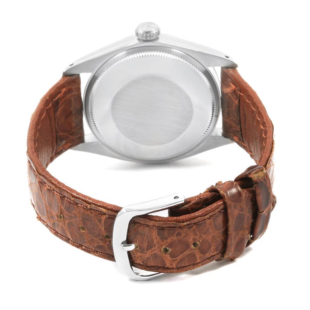 The image shows the back case and leather strap of the Rolex Vintage Collection 1500 Men's Stainless Steel Silver Dial 1500 Men's Stainless Steel Silver Dial watch.