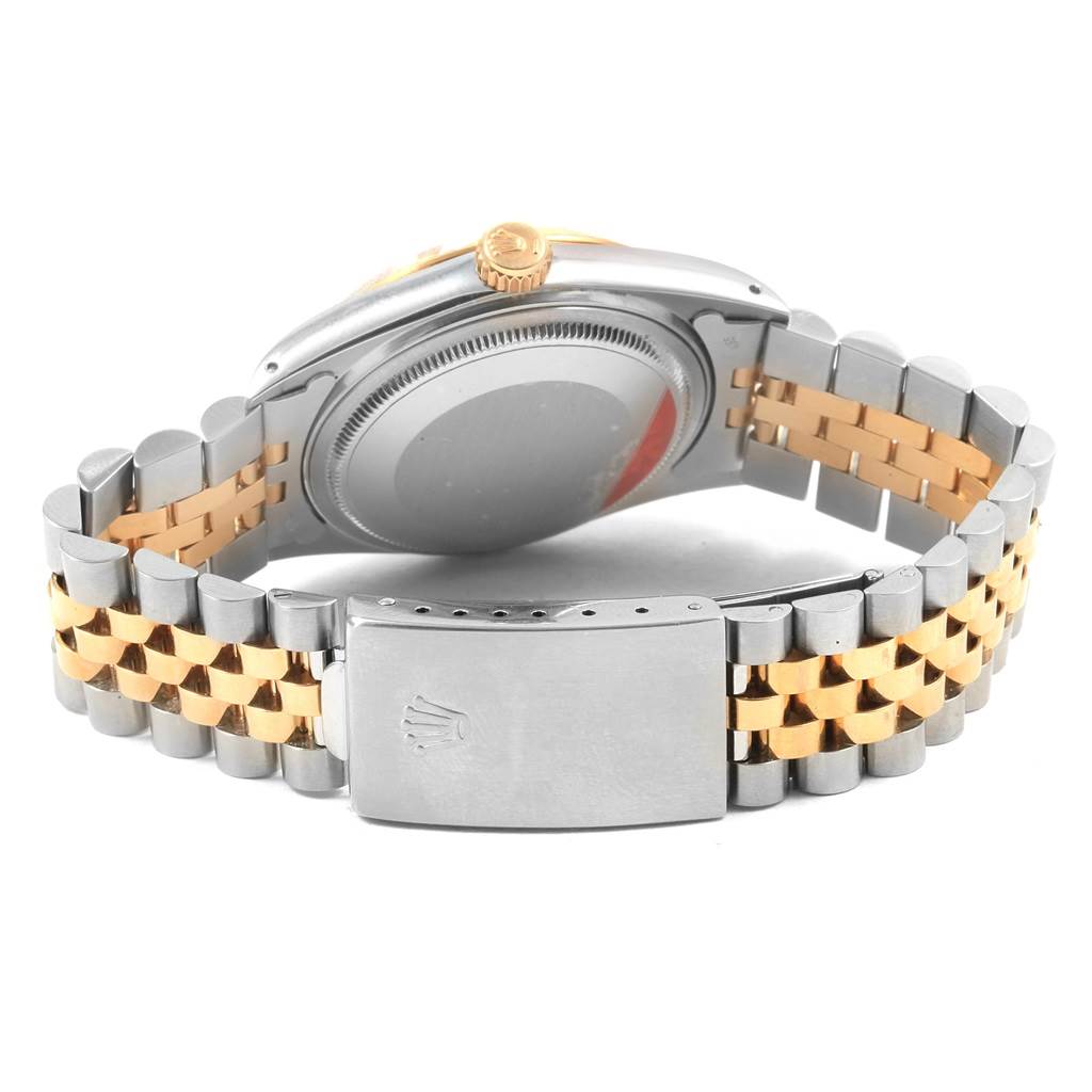 The image shows the back of a Rolex Vintage Collection 16013 Men's Stainless Steel Champagne Dial 16013 Men's Stainless Steel Champagne Dial watch, highlighting the clasp, bracelet, and case back.