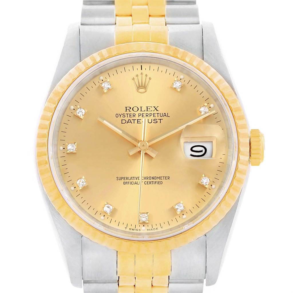 The image shows a frontal view of a Rolex Vintage Collection 16013 Men's Stainless Steel Champagne Dial 16013 Men's Stainless Steel Champagne Dial Oyster Perpetual Datejust watch, highlighting its gold face, bezel, and bracelet.