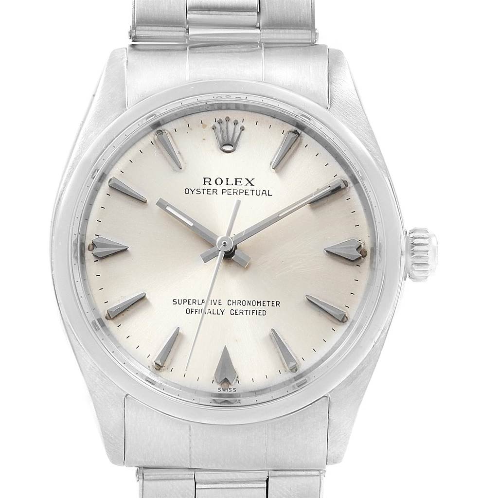 The image shows a front view of a Vintage Collection Rolex Oyster Perpetual watch, highlighting its dial, hands, markers, and crown.