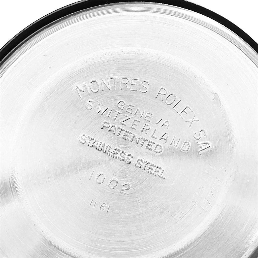 The image shows the inside back cover of a Vintage Collection Rolex watch, highlighting inscriptions and material details.