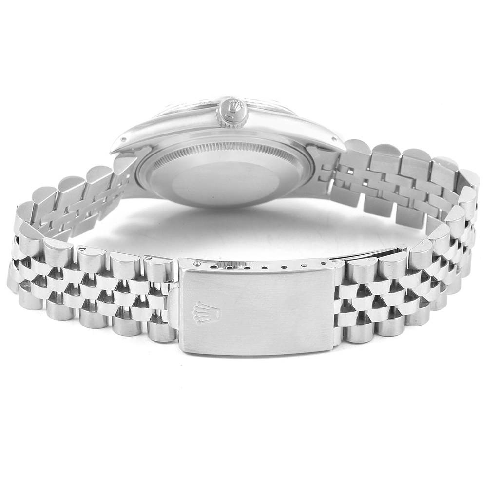 The image shows the backside and bracelet clasp of the Rolex Vintage Collection 16030 Men's Stainless Steel Silver Dial 16030 Men's Stainless Steel Silver Dial model watch in a partially open position.