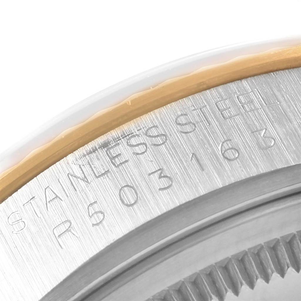 The image shows a close-up of the serial and model number engraving on the stainless steel back of a Rolex Vintage Collection 16013 Men's Stainless Steel Champagne Dial 16013 Men's Stainless Steel Champagne Dial watch.