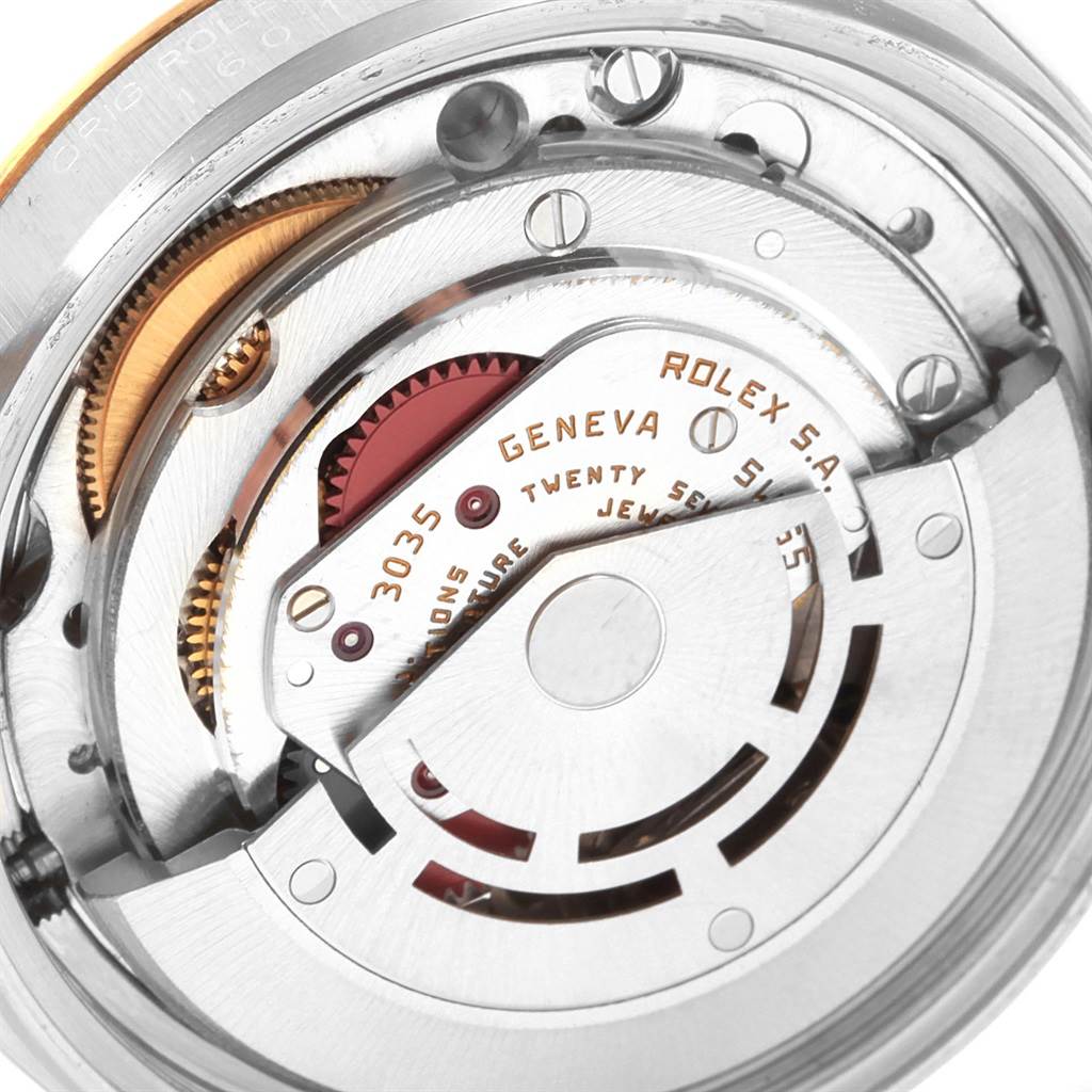 This is a close-up view of the inner mechanical movement of a Vintage Collection Rolex watch, model 3035.