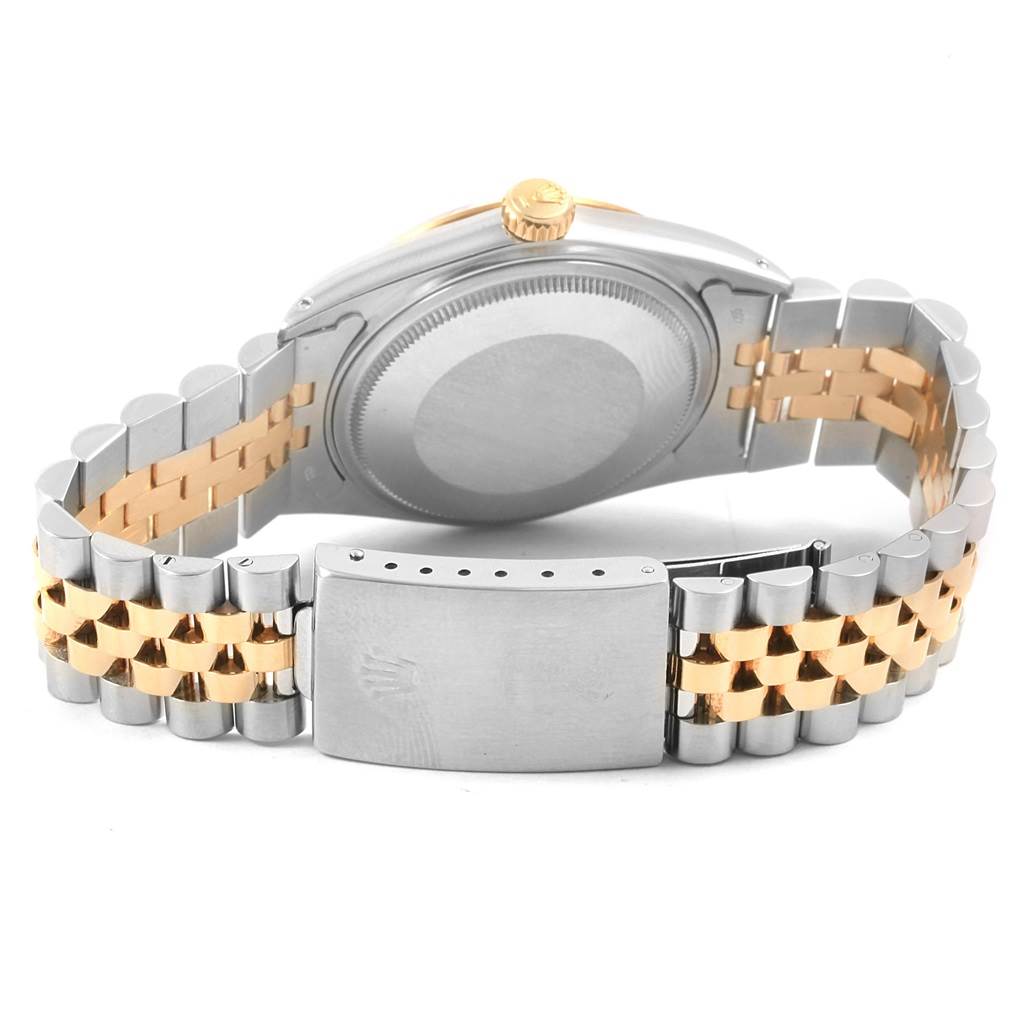 This image shows the back view of the Rolex Vintage Collection 16013 Men's Stainless Steel Champagne Dial 16013 Men's Stainless Steel Champagne Dial watch, highlighting its metal case and two-tone bracelet.