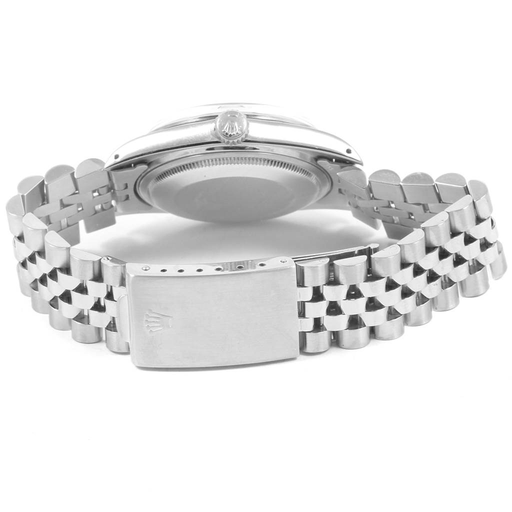 The image shows the back view of a Rolex Vintage Collection 16000 Men's Stainless Steel White Dial 16000 Men's Stainless Steel White Dial watch, highlighting the case back and the clasp of the metal bracelet.