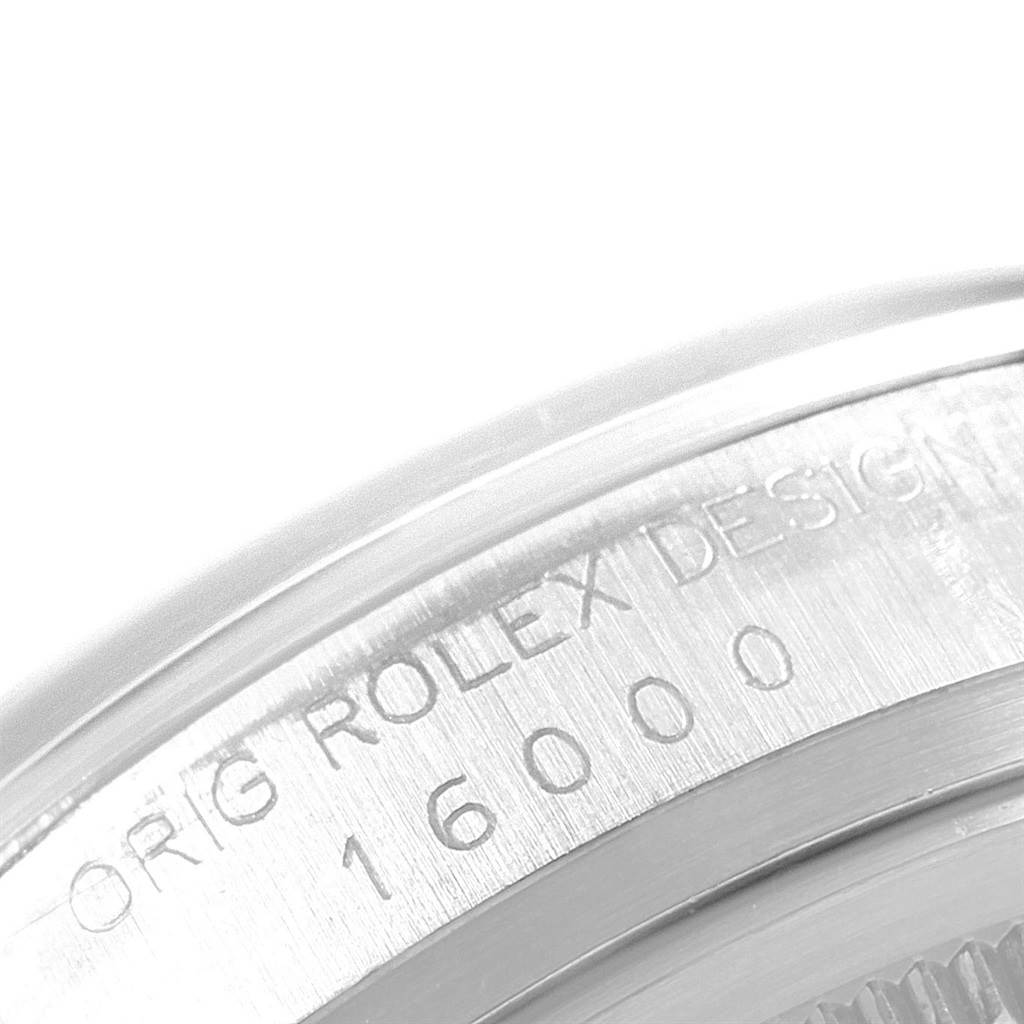 This image shows a close-up of the case back engraving on a Vintage Collection model by Rolex, displaying "ORIG ROLEX DESIGN" and the model number "16000".