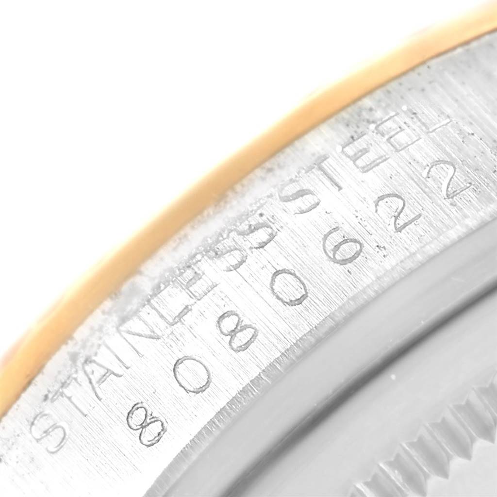 The image shows a close-up of the stainless steel case back and engraved serial number of the Rolex Vintage Collection 16013 Men's Stainless Steel Champagne Dial 16013 Men's Stainless Steel Champagne Dial model.