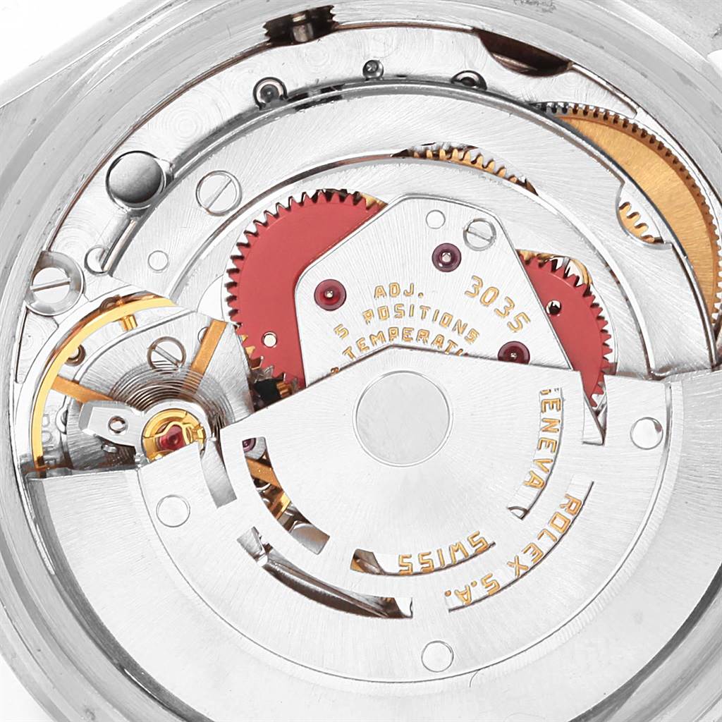 This image shows a close-up view of the Rolex Vintage Collection 16013 Men's Stainless Steel Champagne Dial 16013 Men's Stainless Steel Champagne Dial model's intricate watch movement mechanism.