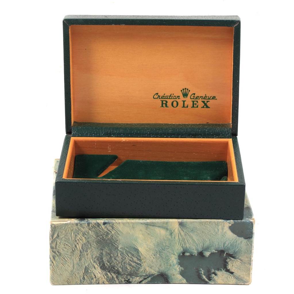 This is an open Rolex Vintage Collection 16014 Men's Stainless Steel Silver Dial 16014 Men's Stainless Steel Silver Dial watch box, displaying its interior and logo.
