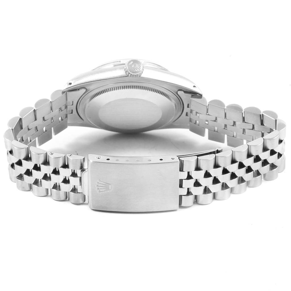 This image shows the back and bracelet of the Rolex Vintage Collection 16014 Men's Stainless Steel Silver Dial 16014 Men's Stainless Steel Silver Dial watch in a partially closed position.