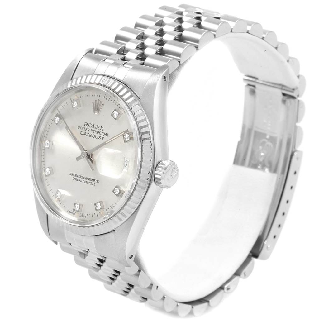 The image shows a side-angle view of the Rolex Vintage Collection 16014 Men's Stainless Steel Silver Dial 16014 Men's Stainless Steel Silver Dial Oyster Perpetual Datejust, displaying the face, bezel, crown, and bracelet.