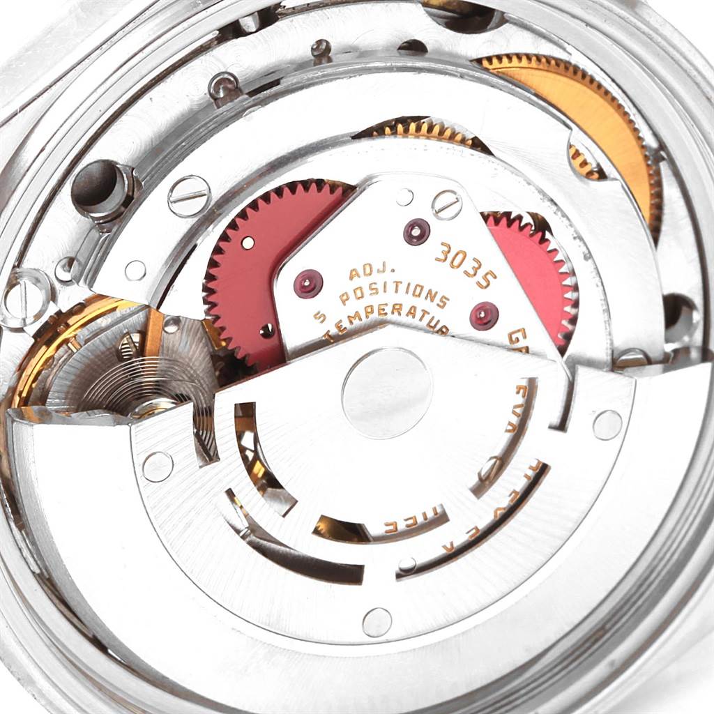 The image shows the inner mechanical components of a Rolex Vintage Collection 16014 Men's Stainless Steel Silver Dial 16014 Men's Stainless Steel Silver Dial watch, highlighting the movement mechanism.
