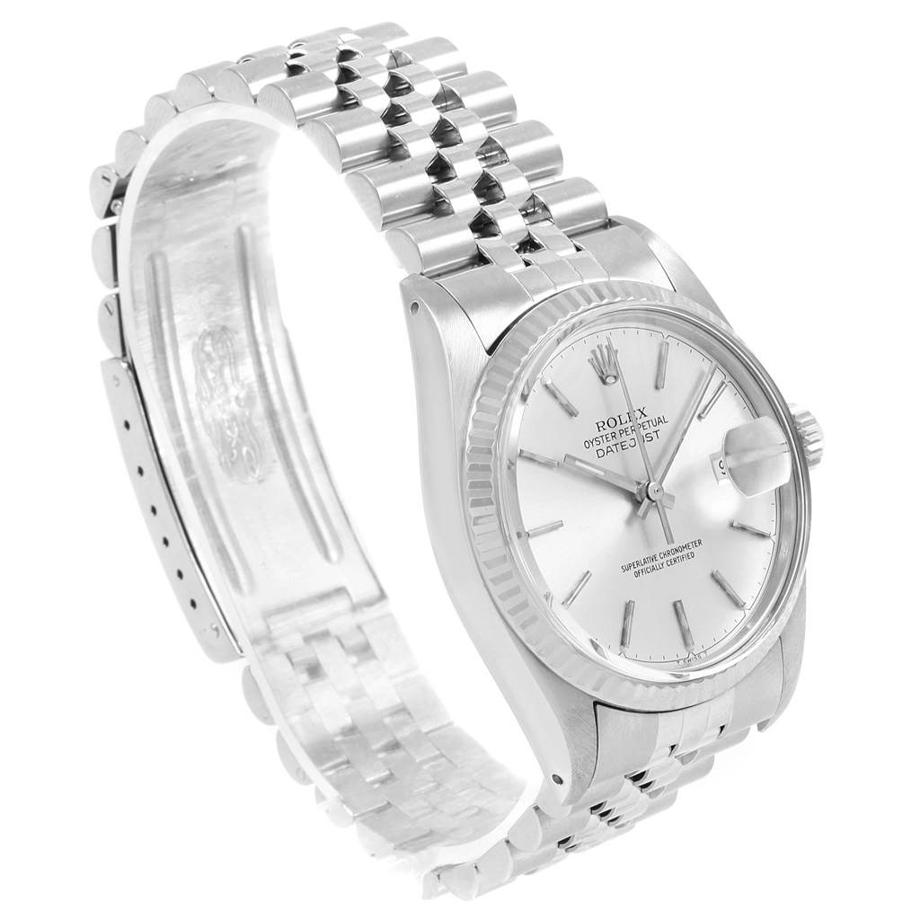 The image shows a side angle view of the Rolex Vintage Collection 16014 Men's Stainless Steel Silver Dial 16014 Men's Stainless Steel Silver Dial model, displaying the watch face, bracelet, and clasp partially open.