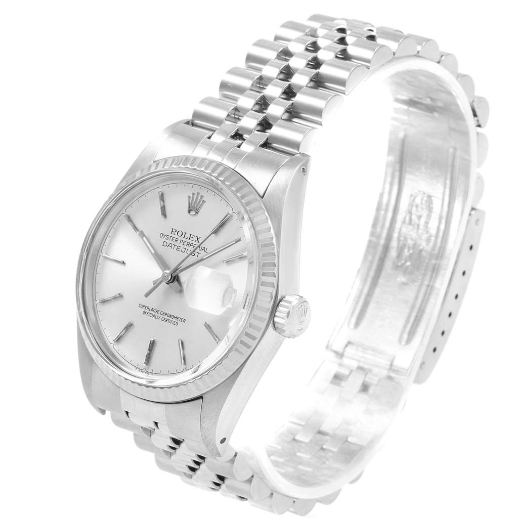 The image shows a side angle view of the Rolex Vintage Collection 16014 Men's Stainless Steel Silver Dial 16014 Men's Stainless Steel Silver Dial model watch, prominently displaying its dial and metal bracelet.