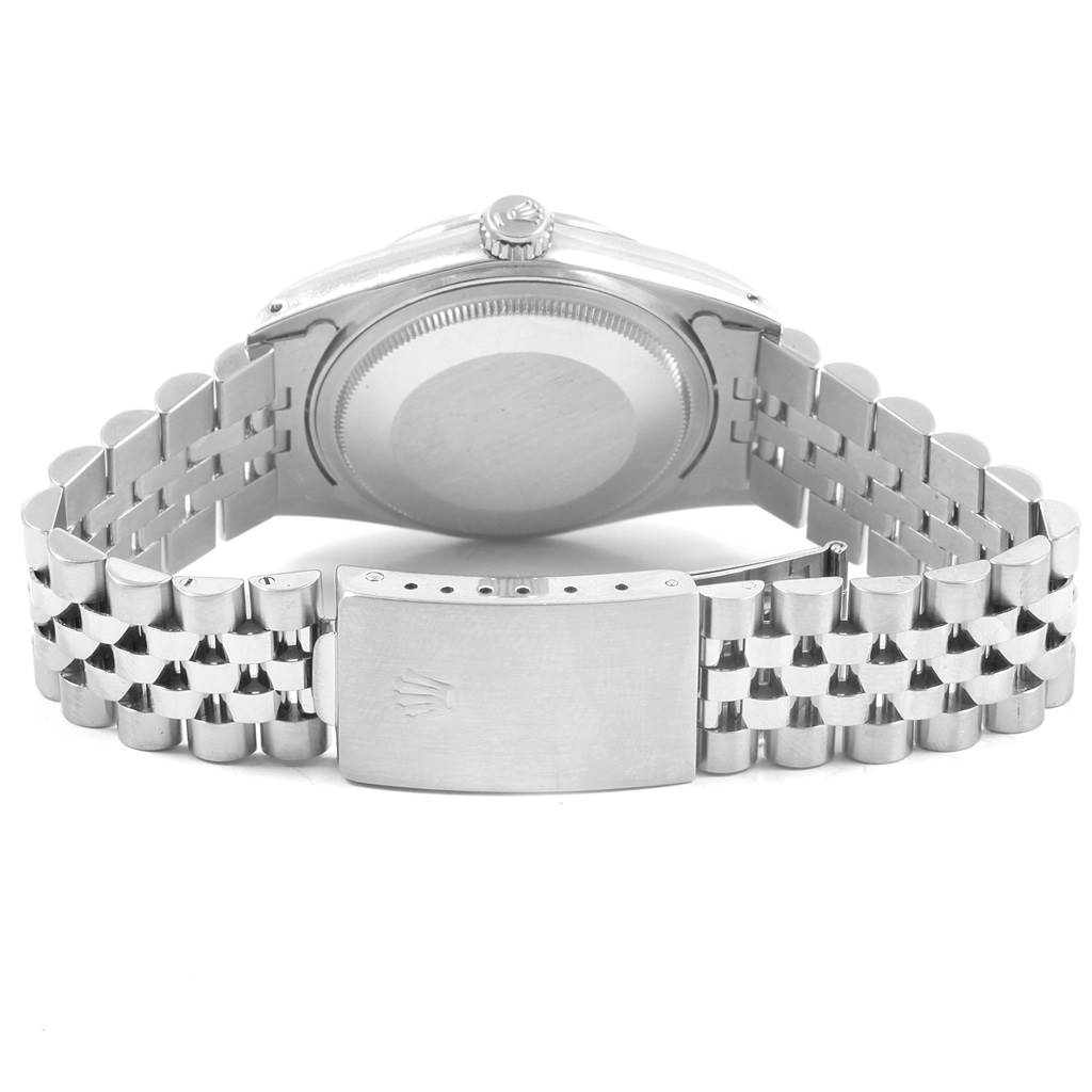 The image shows a Vintage Collection Rolex watch from the back, highlighting the bracelet and case back.