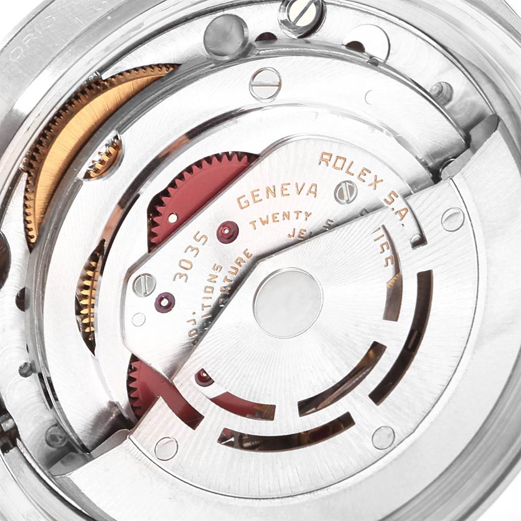 This image shows the internal mechanical movement parts of a Vintage Collection Rolex watch at a close-up angle.