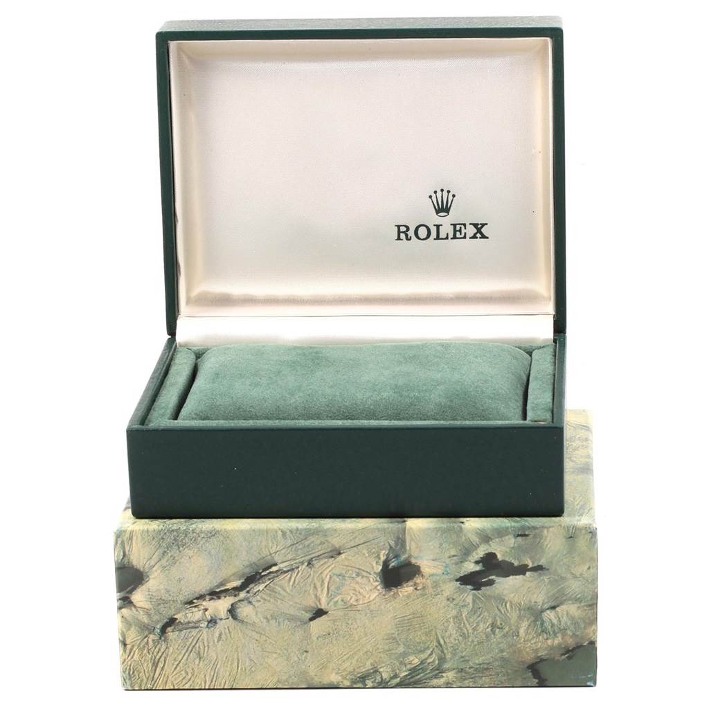 The image shows an open green Rolex watch box for the Vintage Collection model, showing the inside cushion.