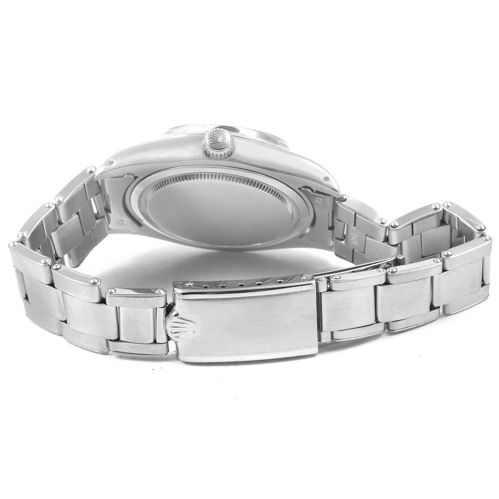 The image shows the backside and band of a Rolex Vintage Collection 6694 Men's Stainless Steel Grey Dial 6694 Men's Stainless Steel Grey Dial watch, highlighting the clasp and case back.