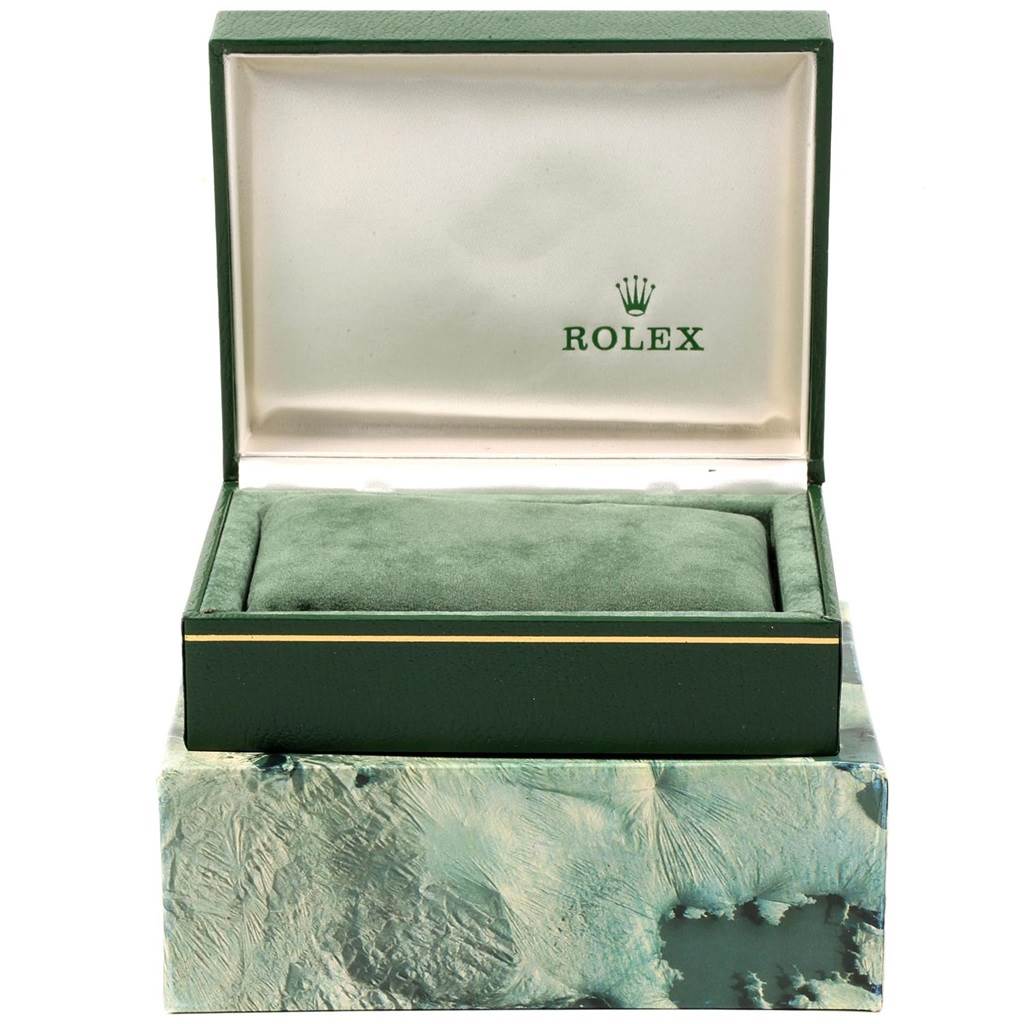 The image shows an open green Rolex box with a cushion inside for the Vintage Collection model.