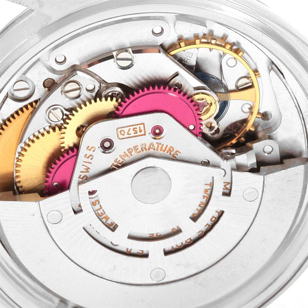 This image shows the internal mechanism and gears of a Rolex Vintage Collection 1603 Men's Stainless Steel Silver Dial 1603 Men's Stainless Steel Silver Dial watch, viewed from the back.