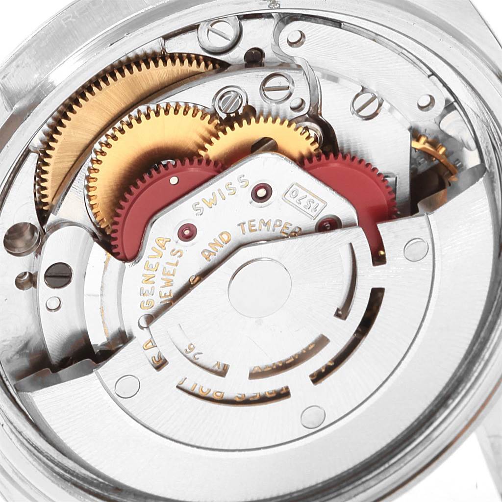 This image shows the inner mechanism and gears of the Rolex Vintage Collection 1601 Men's Stainless Steel Grey Dial 1601 Men's Stainless Steel Grey Dial watch from a close-up angle.