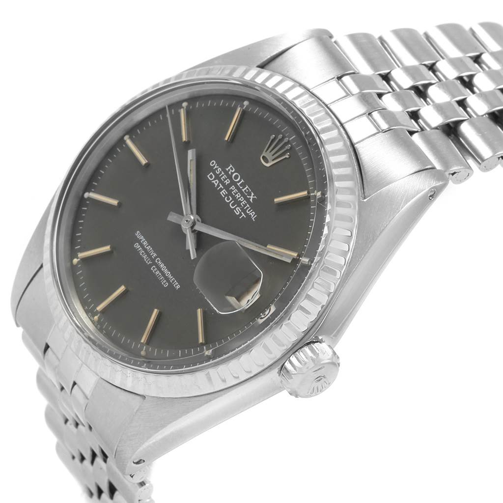 This image shows a Rolex Vintage Collection 1601 Men's Stainless Steel Grey Dial 1601 Men's Stainless Steel Grey Dial Datejust watch at a slight side angle, highlighting the dial, bezel, and bracelet.