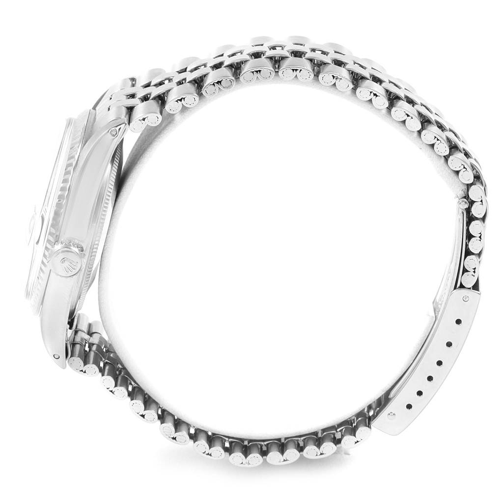 The image shows a side view of the Rolex Vintage Collection 1601 Men's Stainless Steel Grey Dial 1601 Men's Stainless Steel Grey Dial watch, highlighting its case and metal bracelet.