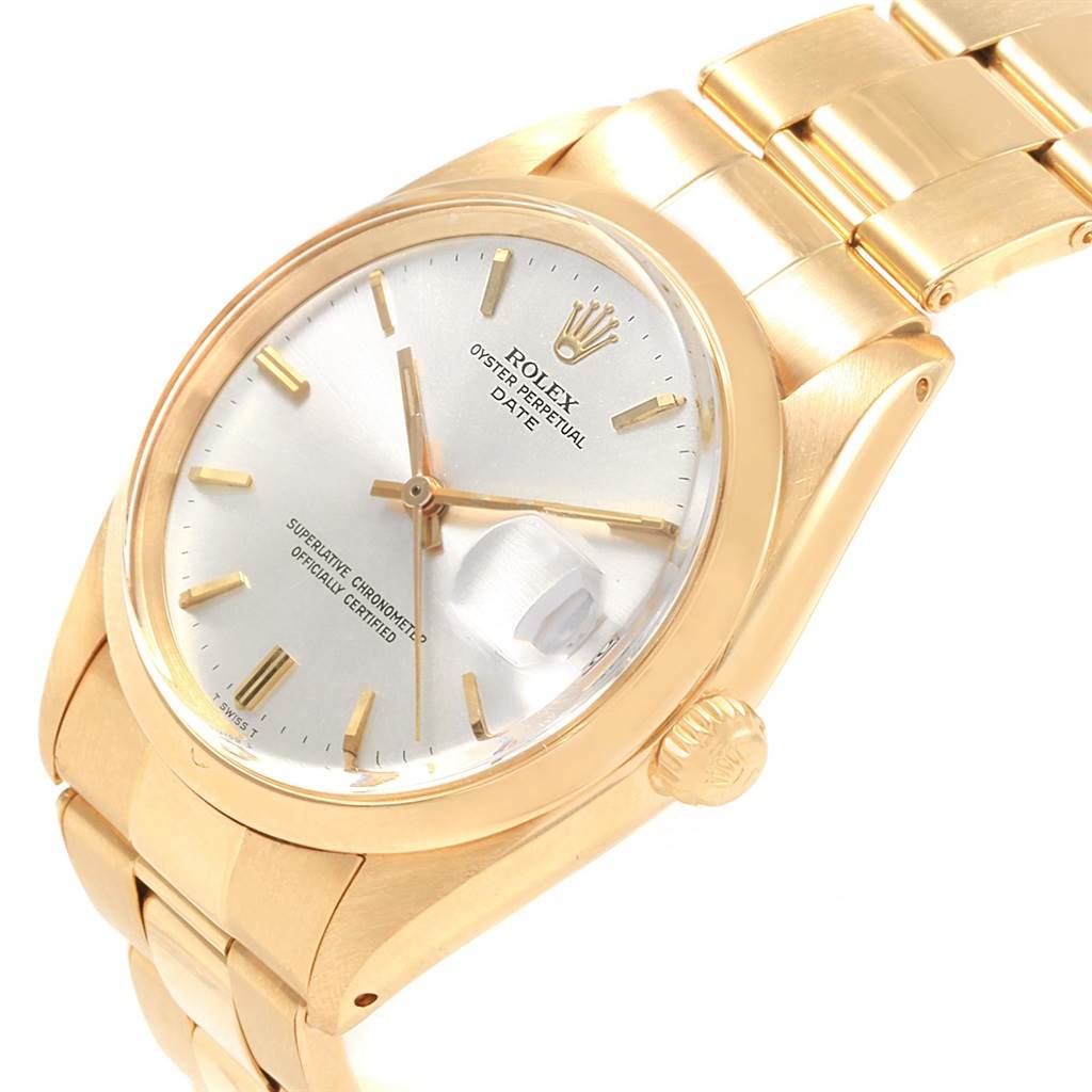 The image shows a Rolex Vintage Collection 1500 Men's Yellow Gold Silver Dial 1500 Men's Yellow Gold Silver Dial watch from an angled view, displaying the dial, crown, and bracelet.